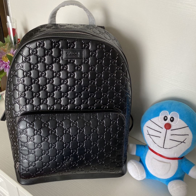 G*u*i backpacks